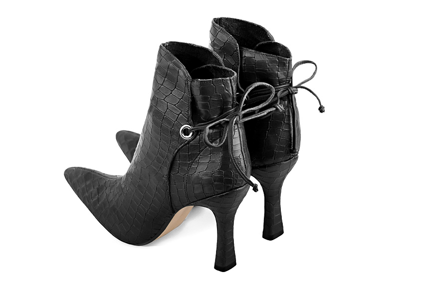 Dark grey women's ankle boots with laces at the back. Tapered toe. Very high spool heels. Rear view - Florence KOOIJMAN